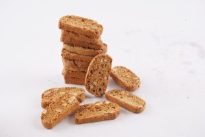 Almond Biscotti 10 A-stack-of-almond-biscotti-arranged-neatly-on-a-white-background-showcasing-their-golden-brown-color-and-crunchy-texture