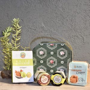 A-table-displaying-a-variety-of-snacks-and-tea-bags-featuring-the-Botanic-Hexa-brand-prominently